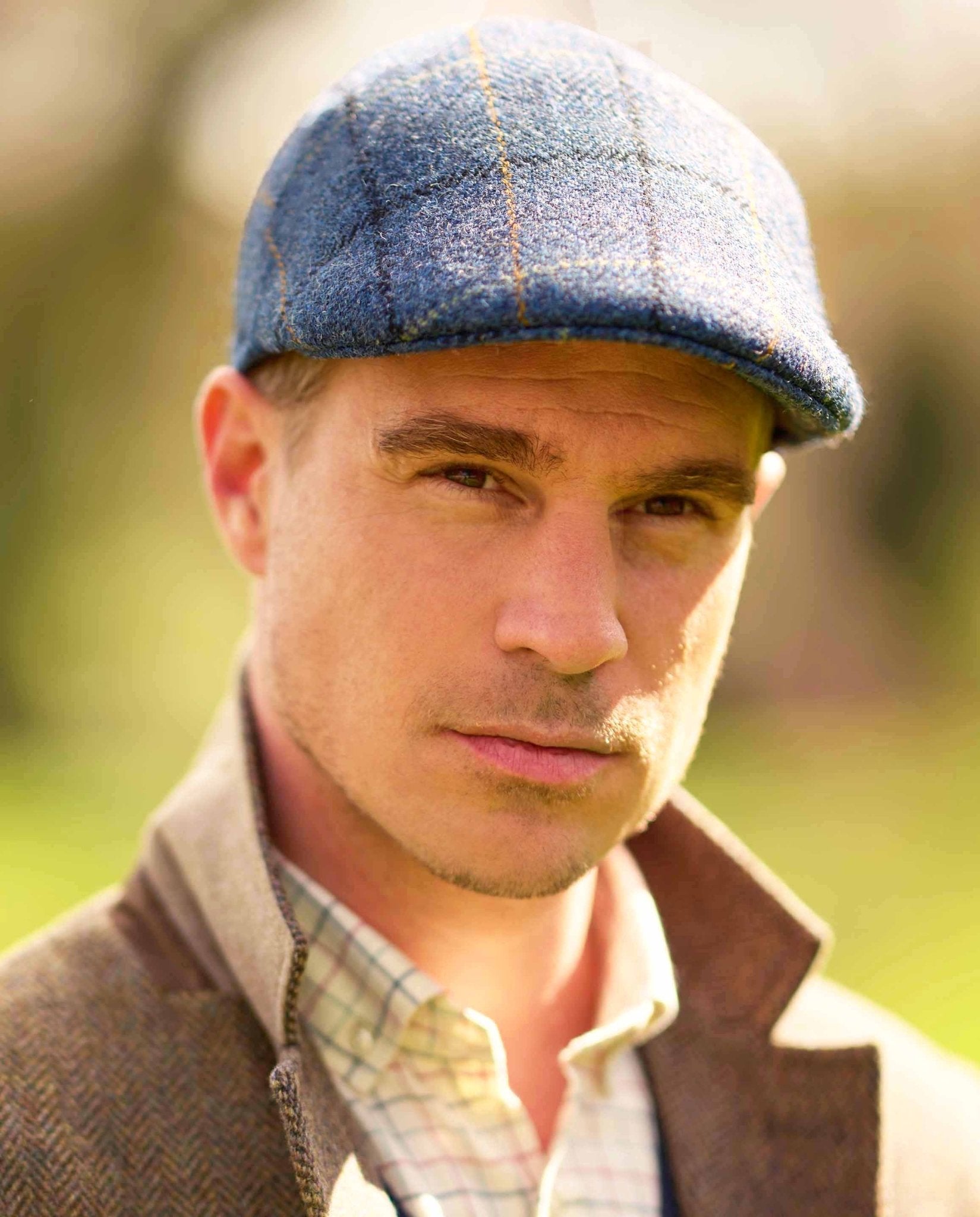 Harris Tweed Mütze "Henry Cap" in blue overcheck - Wellington of Bilmore