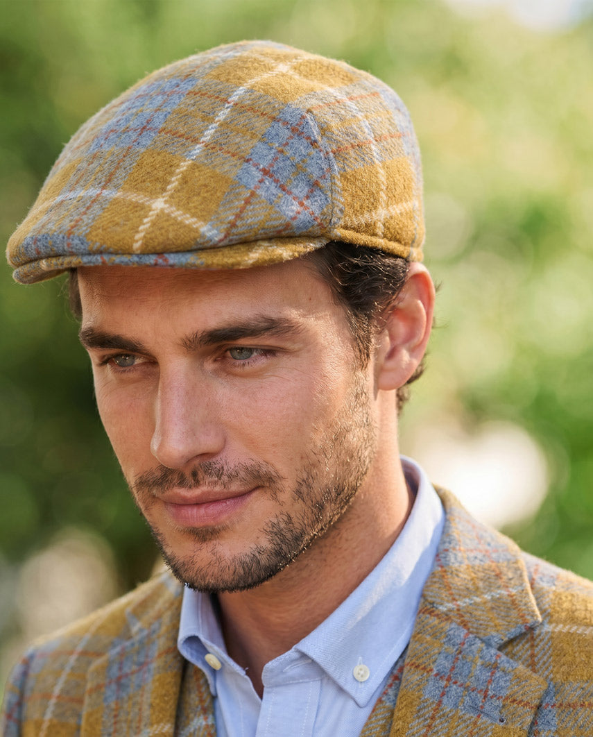 Schiebermütze "Henry Cap" aus original Harris Tweed in amber check