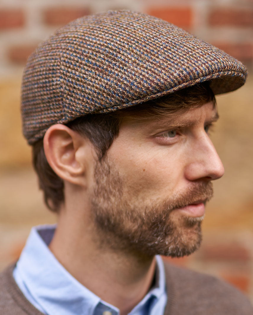 Henry Cap – Harris Tweed Mütze in buntem Hahnentritt