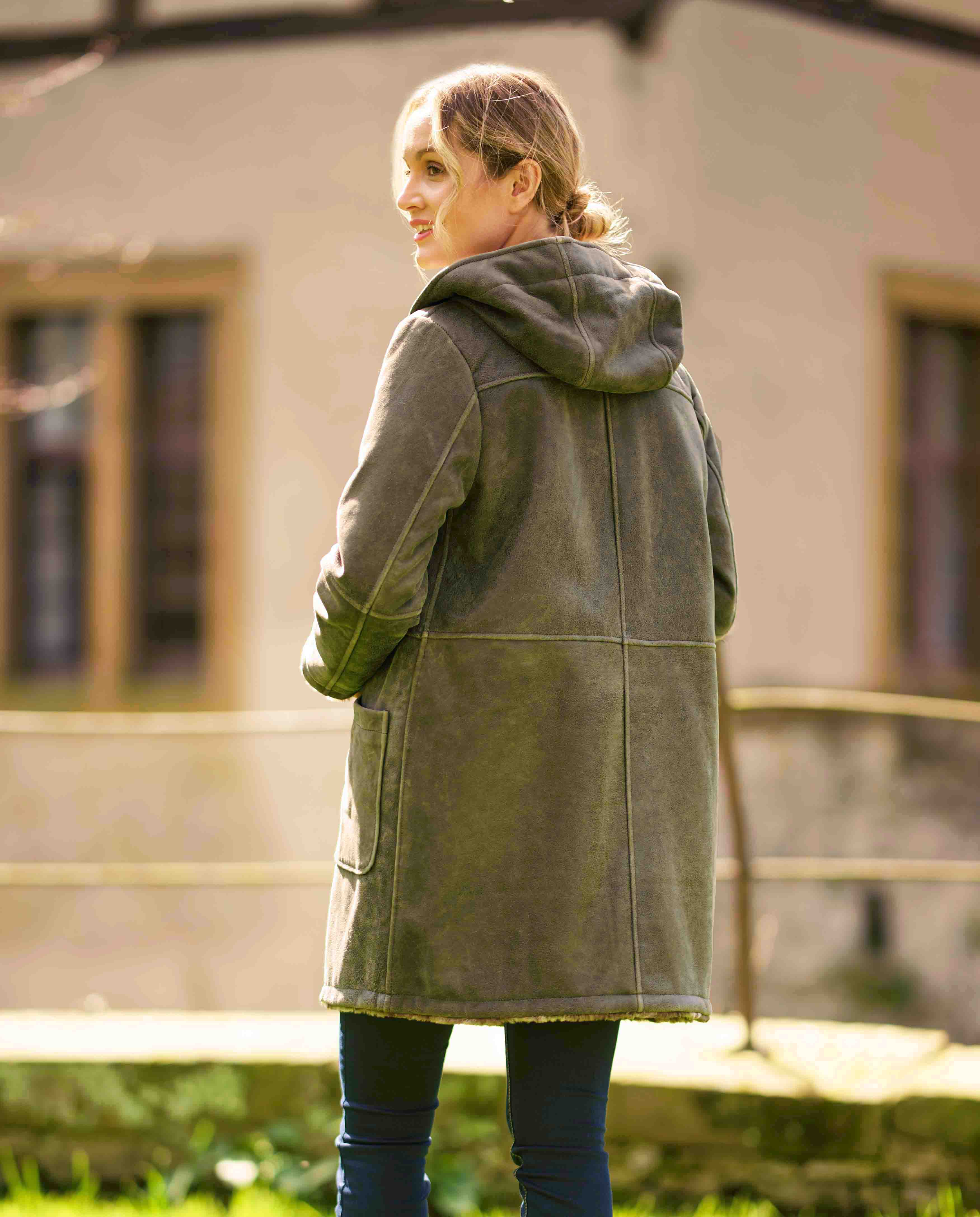 Leather coat for women with cozy lining and hood