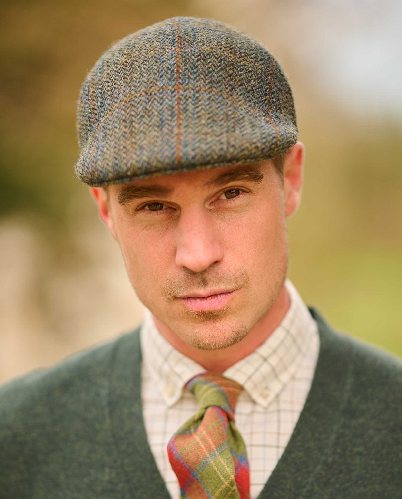 Harris Tweed Mütze "Henry Cap" in oliv - blue Overcheck - Wellington of Bilmore