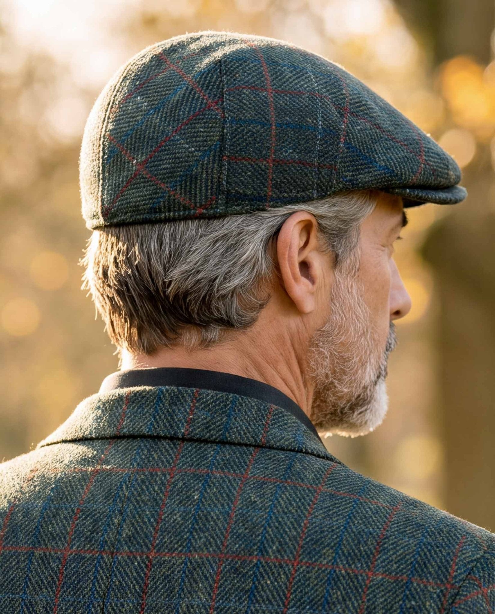 Schiebermütze "Henry Cap" aus original Harris Tweed in royal green Tweed" - Wellington of Bilmore